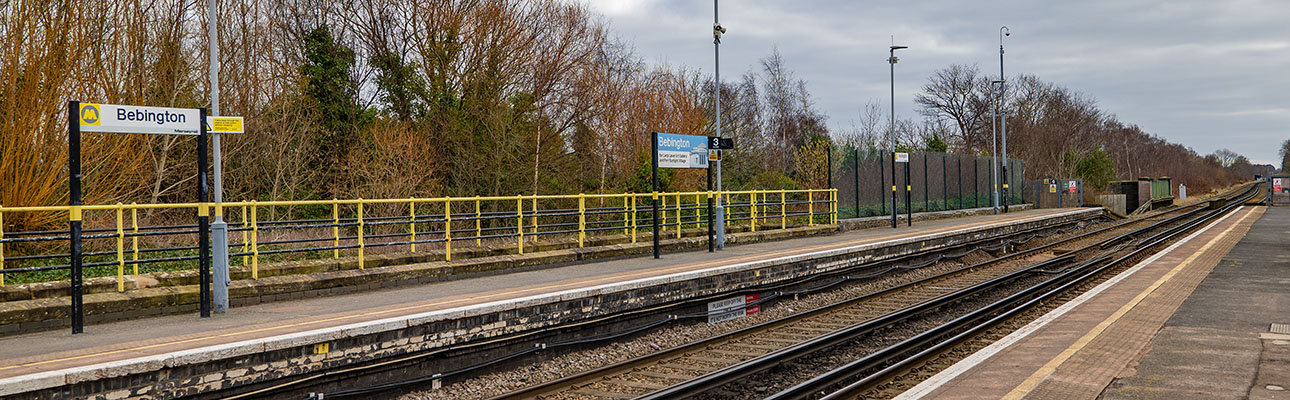 The railway track and platform at Bebington station.