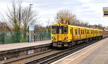 A train arriving at a station platform. 