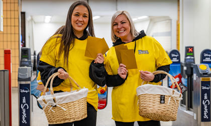 Promotional staff at a Merseyrail station. 