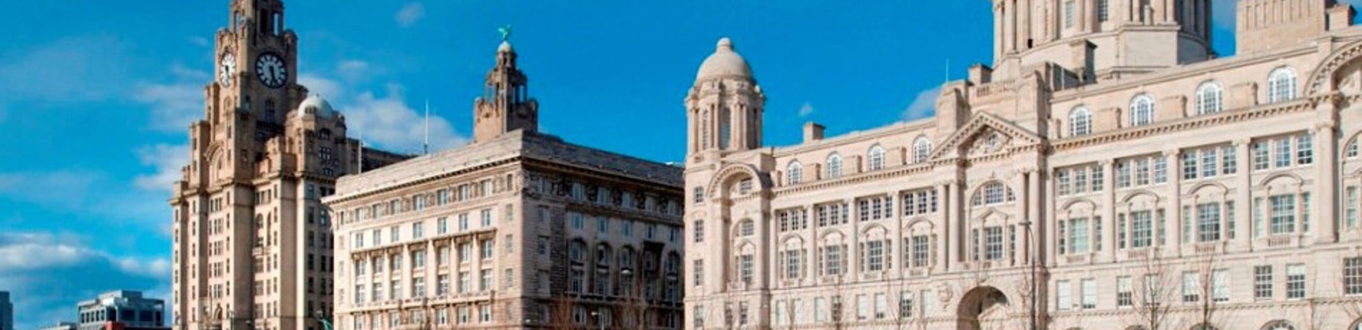 The exteriors of two large buildings at the Pier Head.