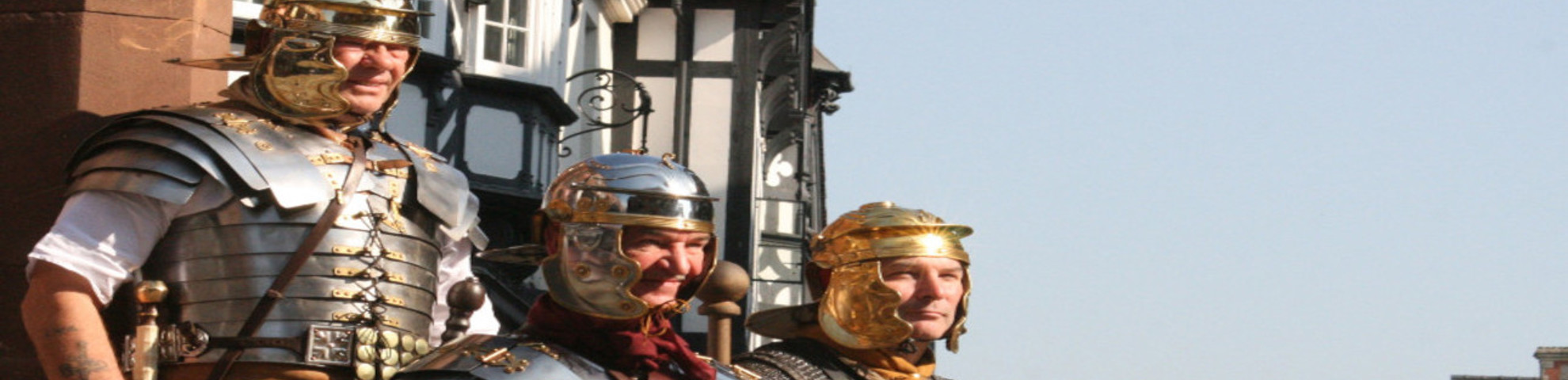 3 men dressed up as Romans at Chester.