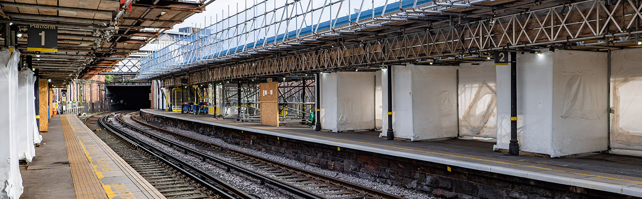 The railway track at Birkenhead Central station. Temporary scaffolding appears.