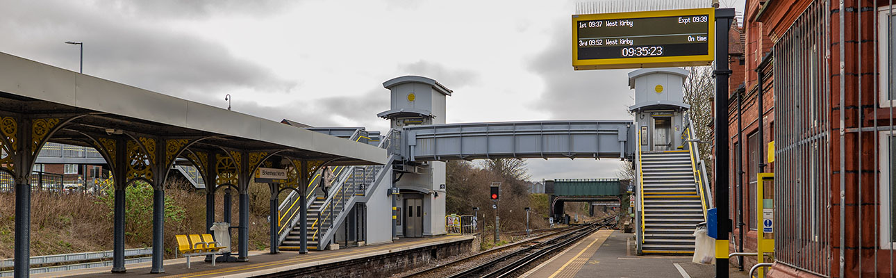 The stairway and footbridge above the rail track at Birkenhead North station. 